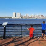 Visiting Philadelphia with kids, looking at the Philadelphia skyline from across the Delaware River in Camden, New Jersey