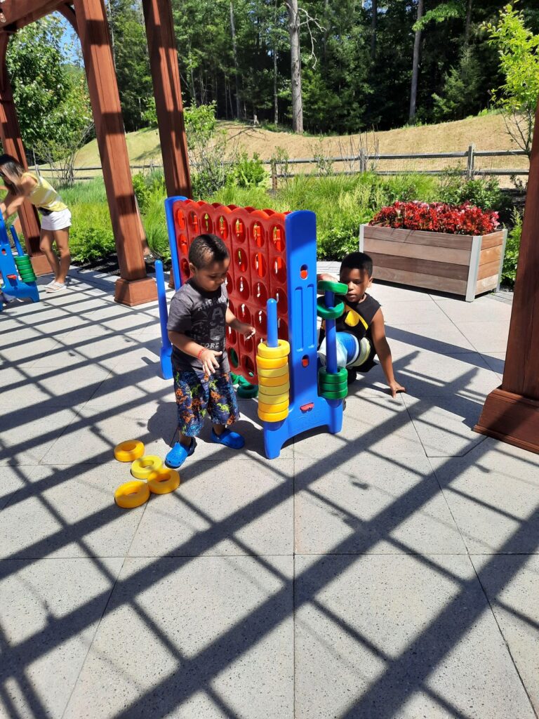Kids Playing connect 4 at the Concord Commons at the Kartrite Resort & Indoor waterpark