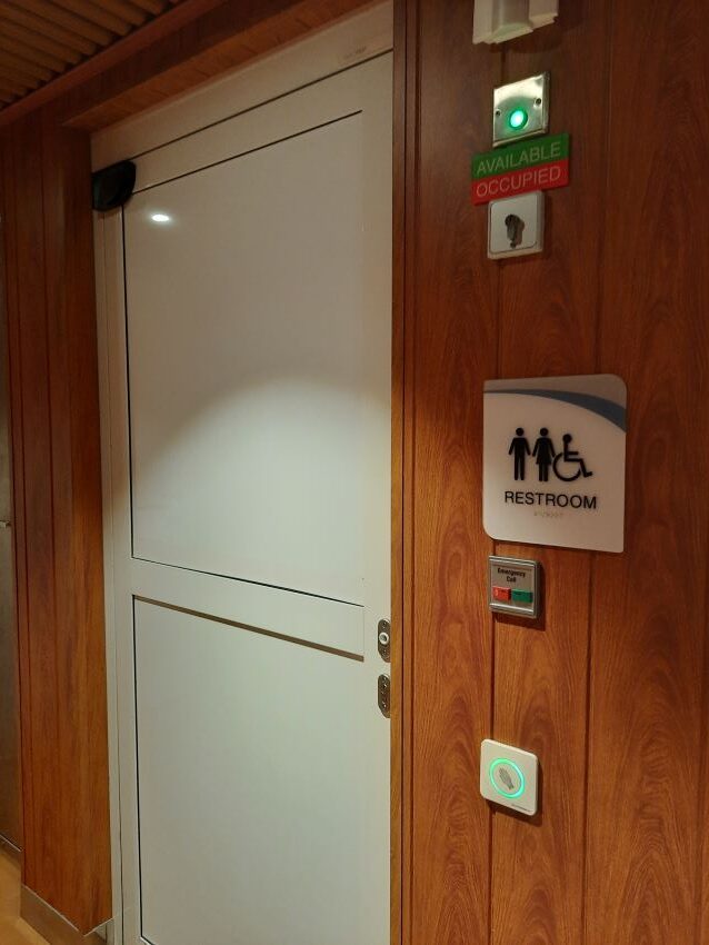 Touchless automatic bathroom door on the Carnival Mardi Gras cruise ship